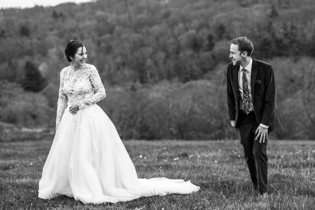 black and white portrait of bride and groom during first look 