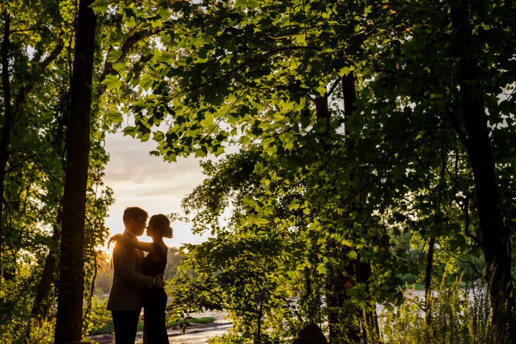 couple embracing at sunset at Belle Isle
