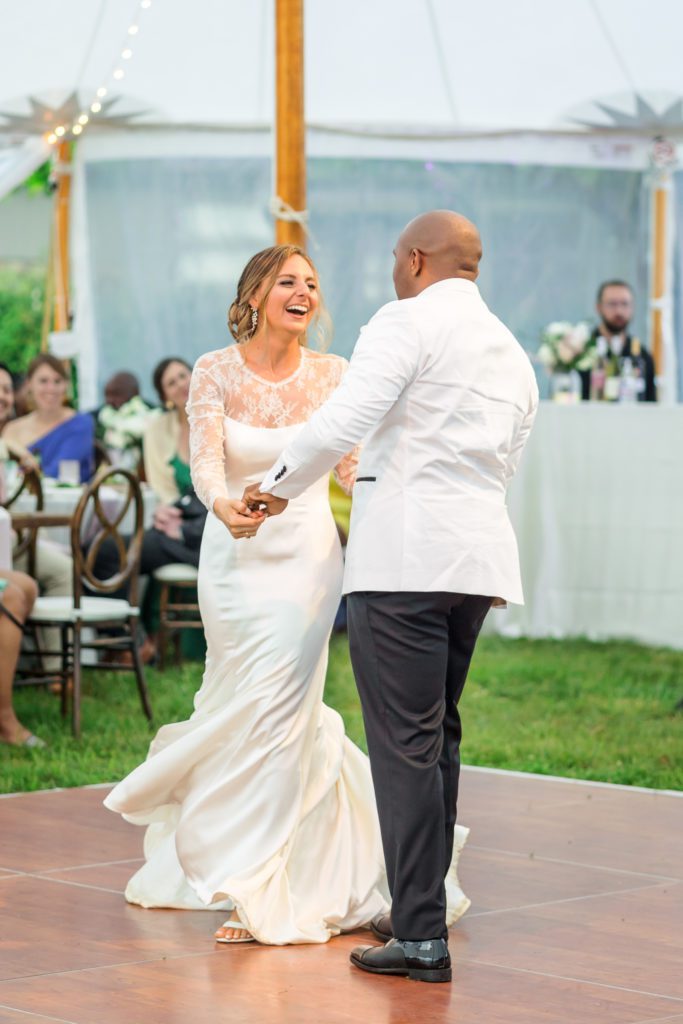 couple dancing together after wedding ceremony