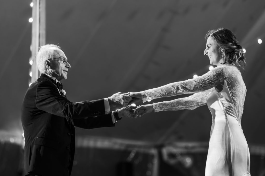 bride dancing with father during father-daughter dance at reception