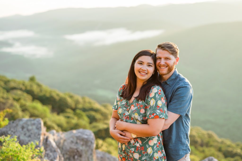 couple embracing and smiling during summer Shenandoah National Park 