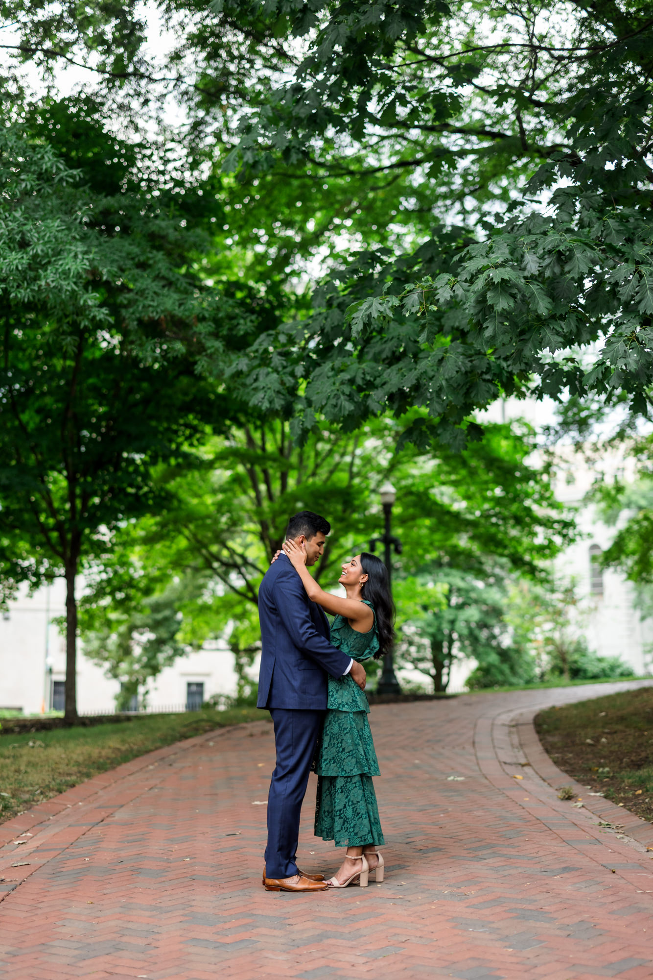 man and woman dancing in garden at state capitol building at richmond engagement session