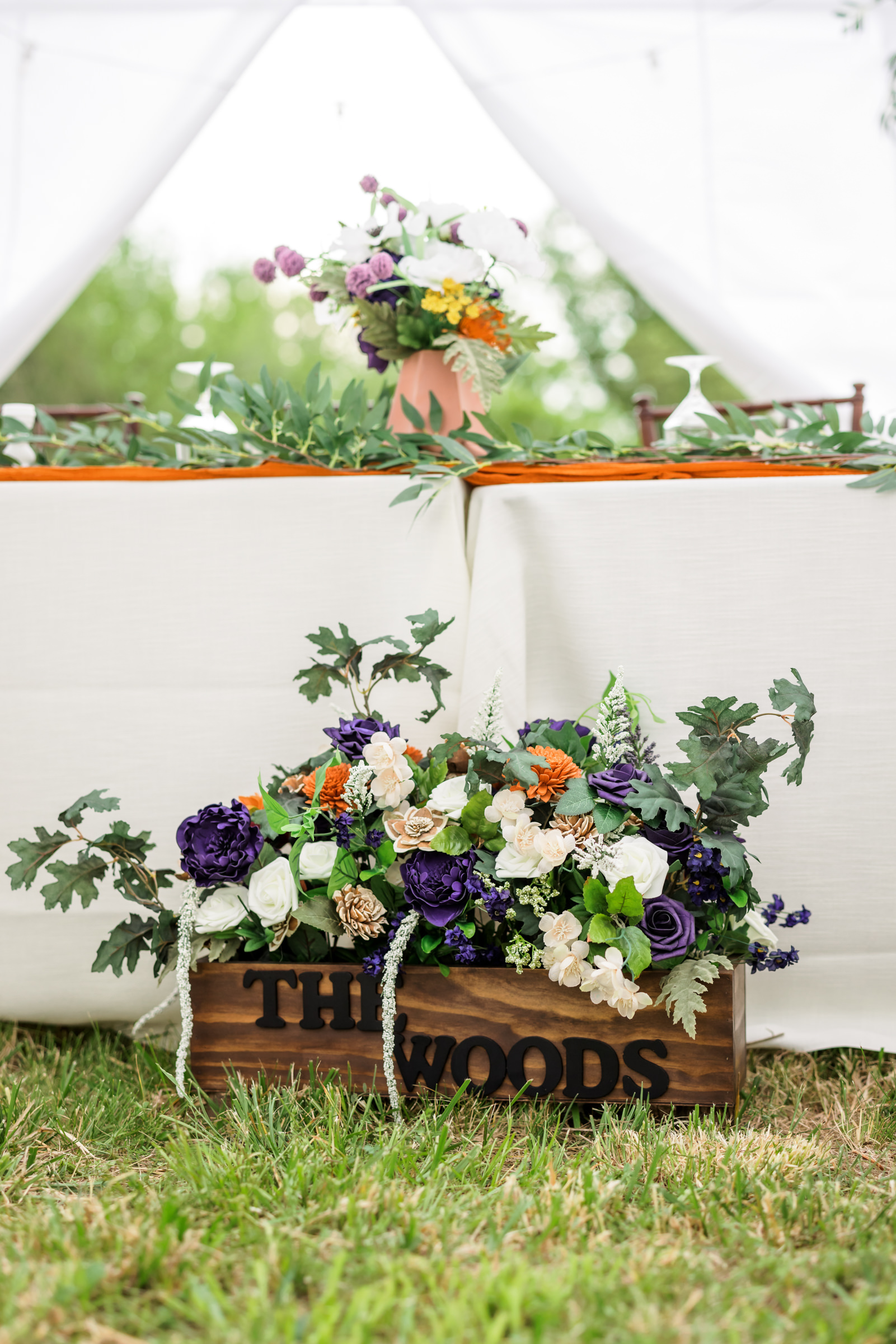 flower box beside wedding head table