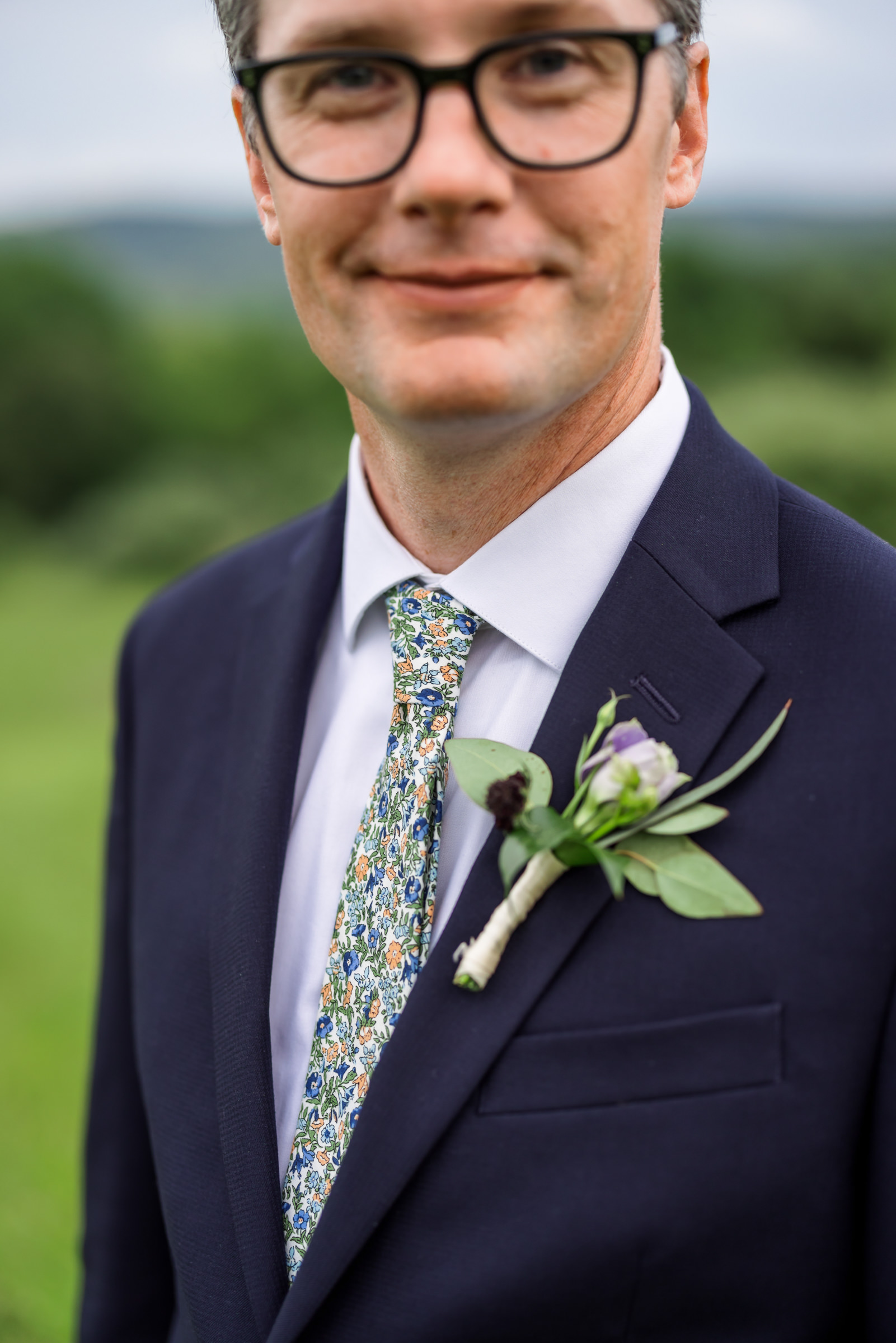 close up of groom's boutonnière
