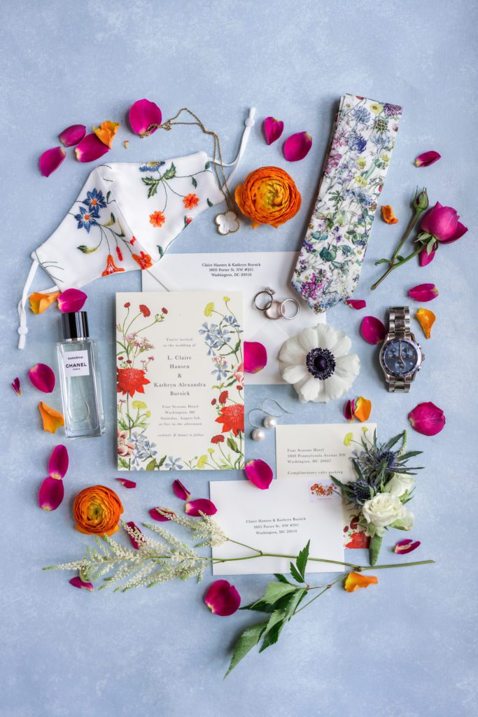 colorful four seasons dc wedding invitation with wedding details 