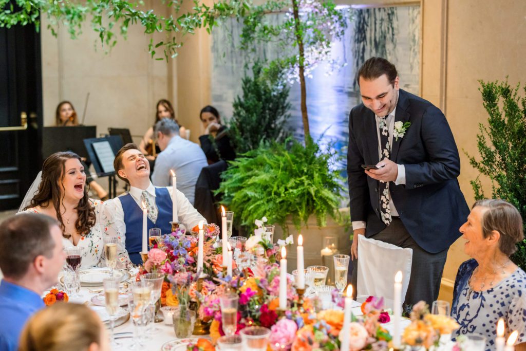 wedding party gives toast at Four Seasons DC wedding reception