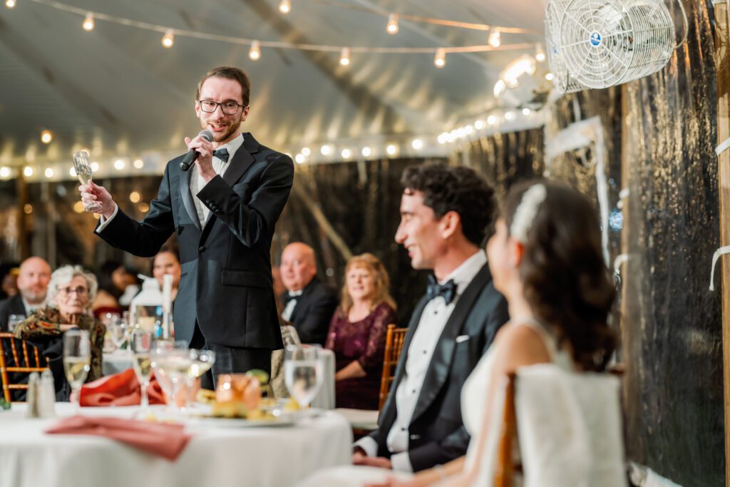 groomsmen toasting to the bride and groom