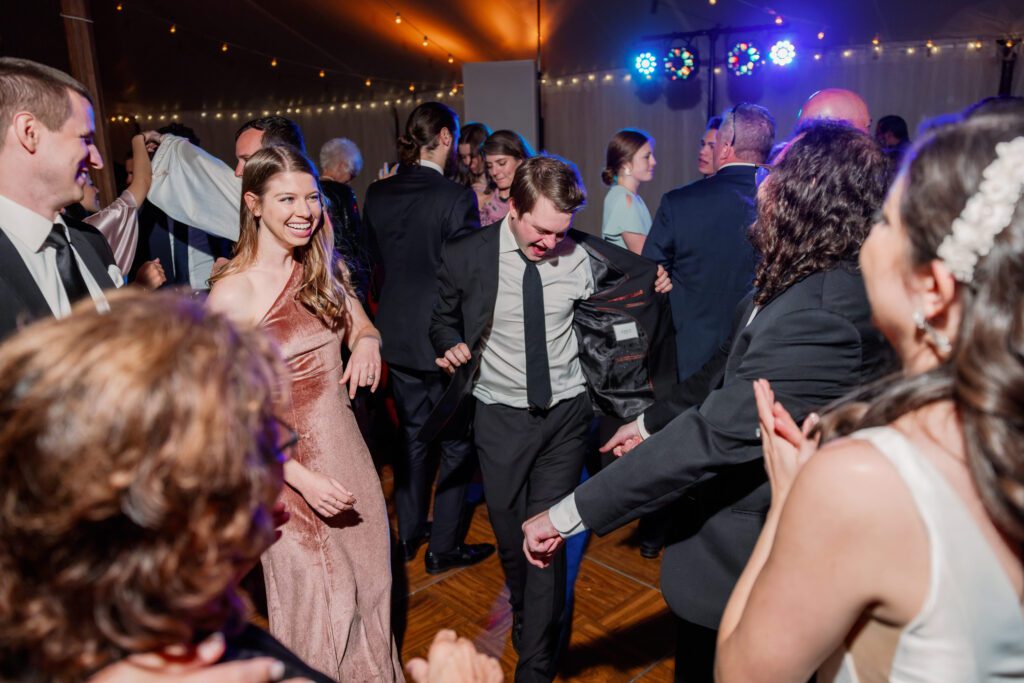 guests dancing during evening reception