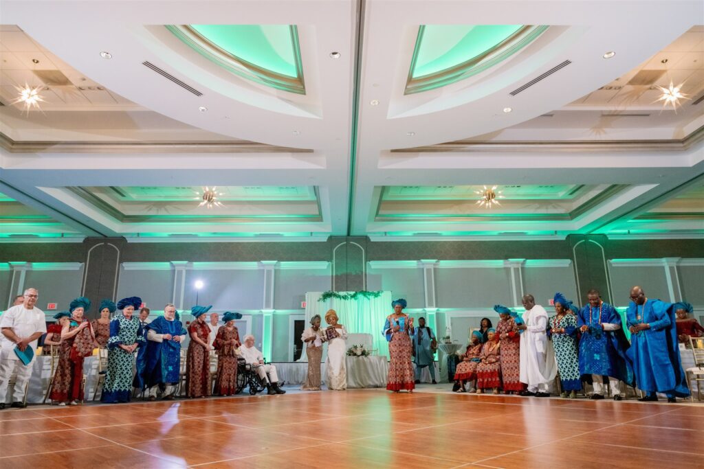 Wedding guests surrounding dance floor