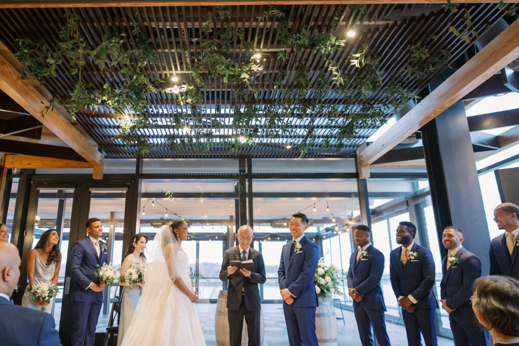 Couple smiling and laughing during ceremony