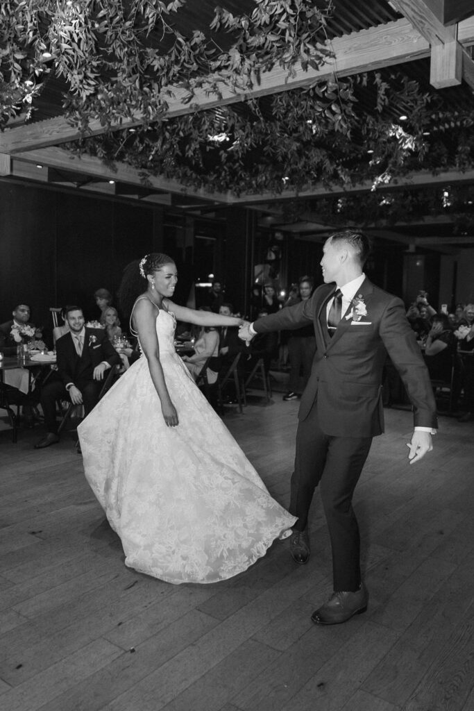 Couple dancing together at evening reception